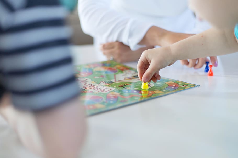 playing-game-kids-table-hands-board-pxfuel